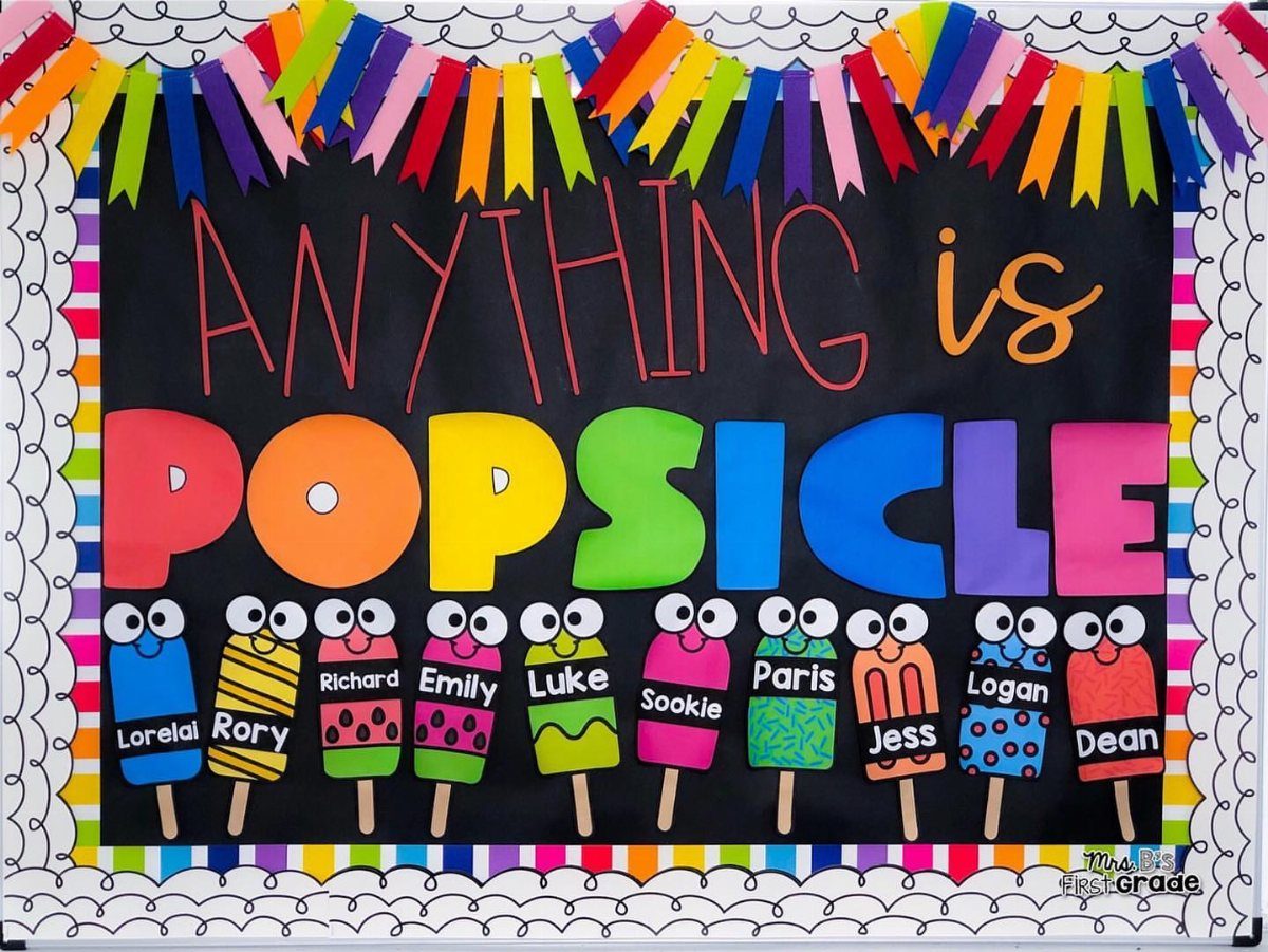 Popsicle themed bulletin board with colorful popsicle cutouts and rainbow decorations.