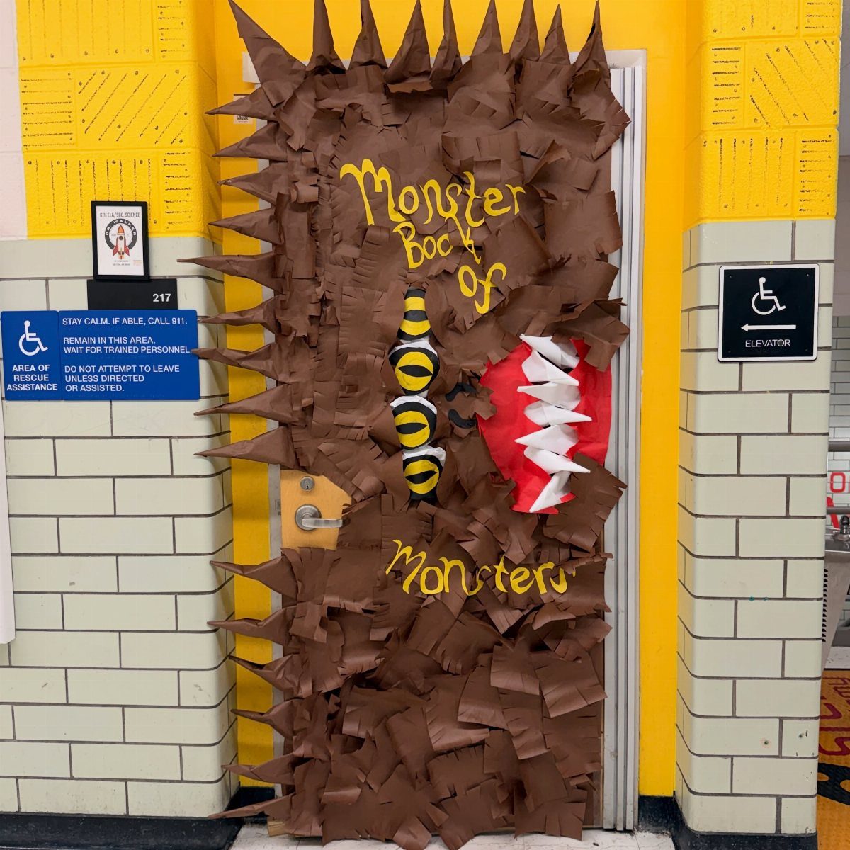 Monster Book of Monsters decorated classroom door with brown fur and open mouth