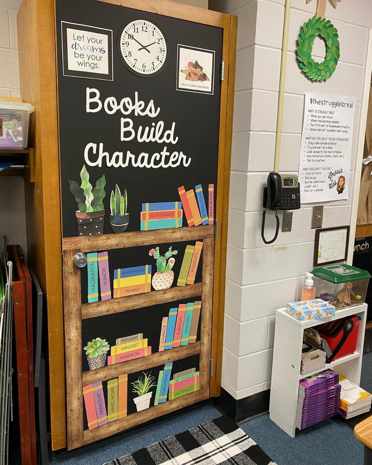 Classroom door decorated as a bookshelf with colorful books and reading quote.