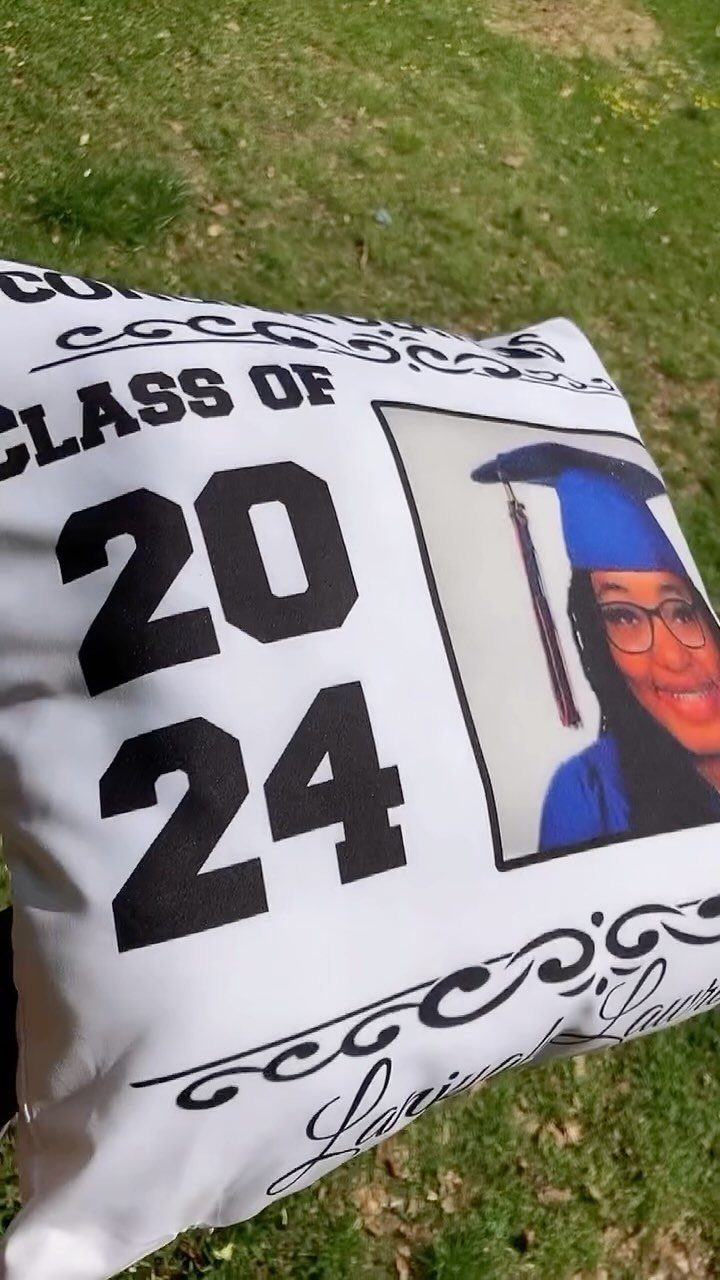 White personalized graduation pillow with a photo and Class of 2024 text.