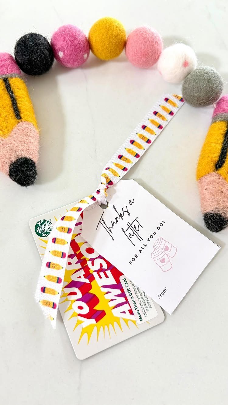 Gift card and thank you tag tied with ribbon and felt garland