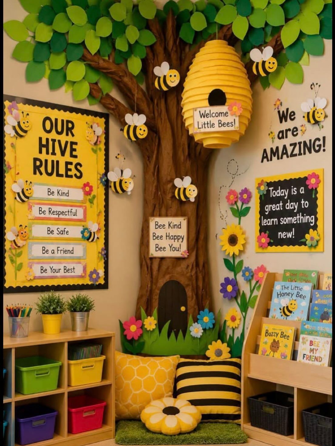 Bee-themed classroom corner with a large 3D tree, beehive, and colorful reading nook.