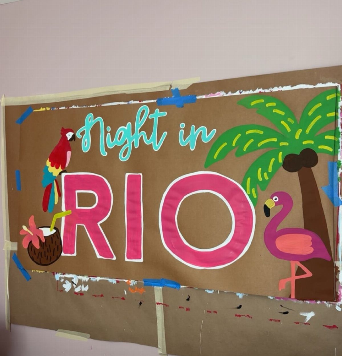 Hand-painted Rio themed poster with a parrot, flamingo, and palm tree.