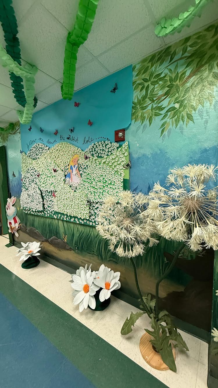 Nature-themed hallway decorations with large 3D dandelions and a scenic wall mural.
