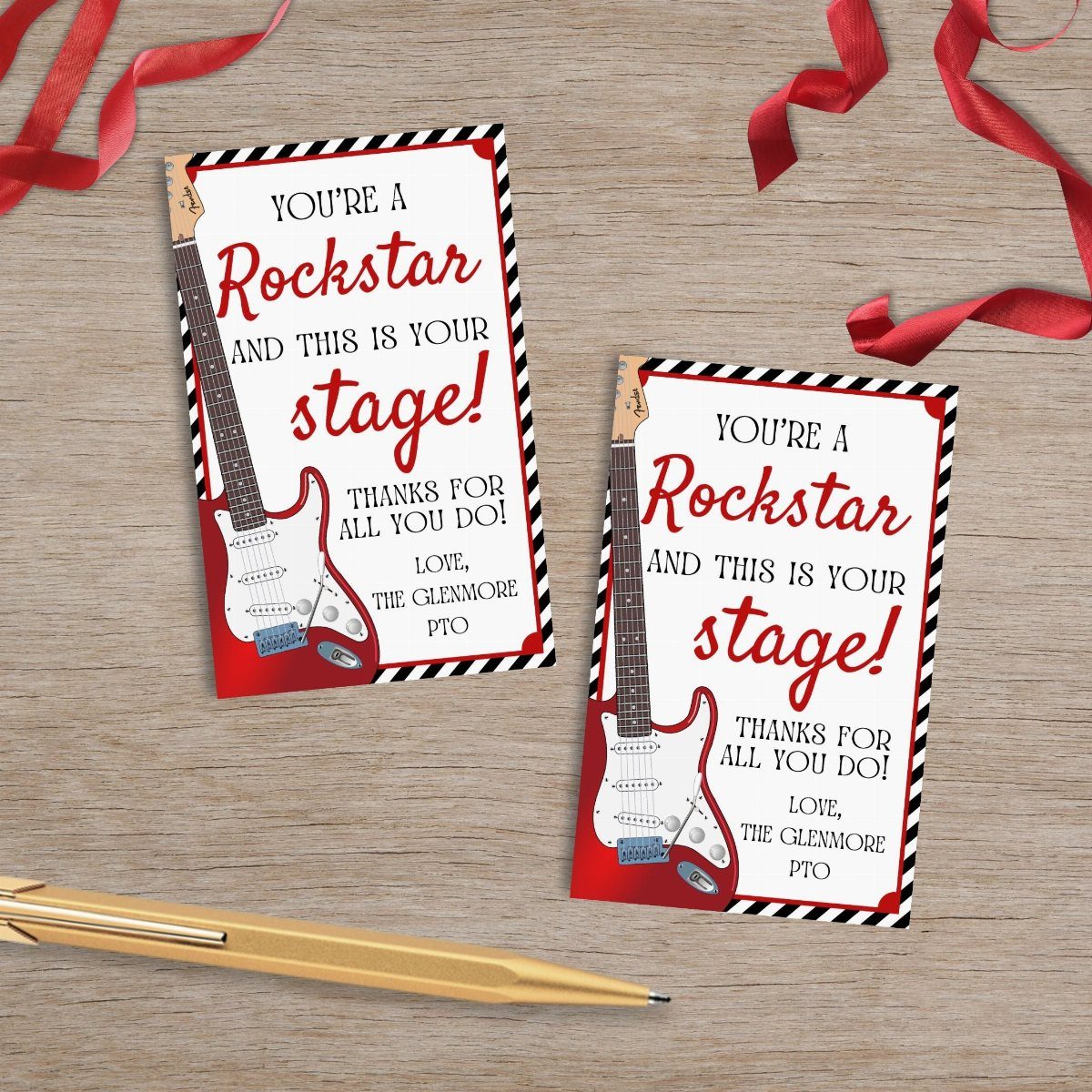 Two rockstar themed teacher appreciation cards with red electric guitars on wooden table