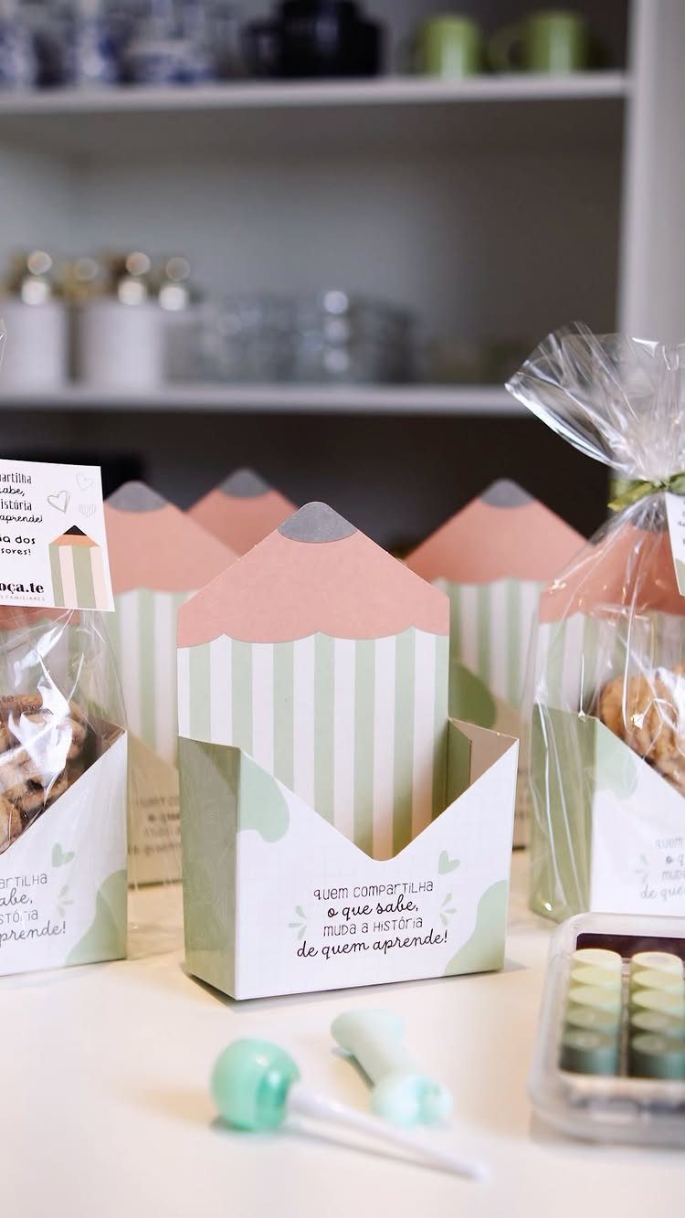 Pencil shaped gift boxes filled with treats for teacher appreciation gifts.