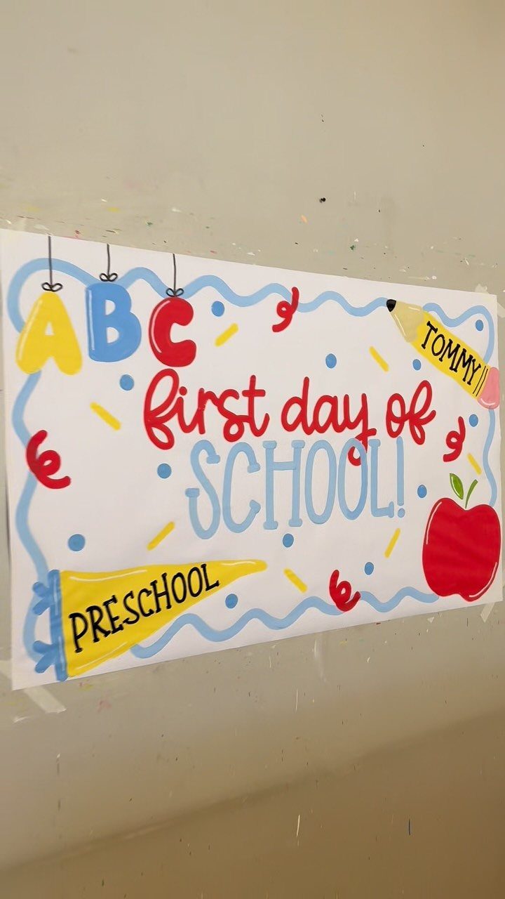 Back to school banner with colorful letters, a red apple, and preschool text.
