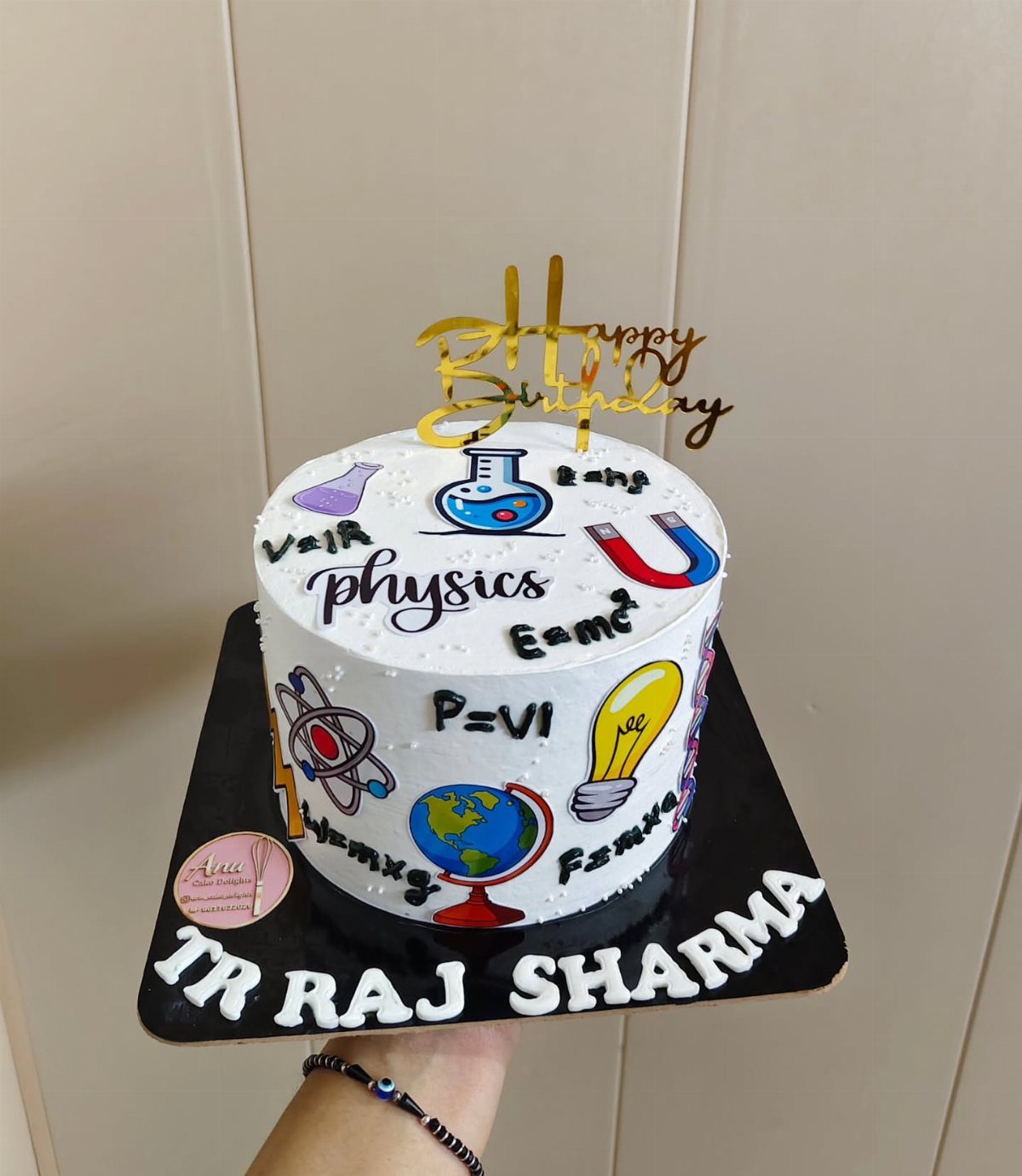 Science themed birthday cake with physics formulas and laboratory equipment drawings.